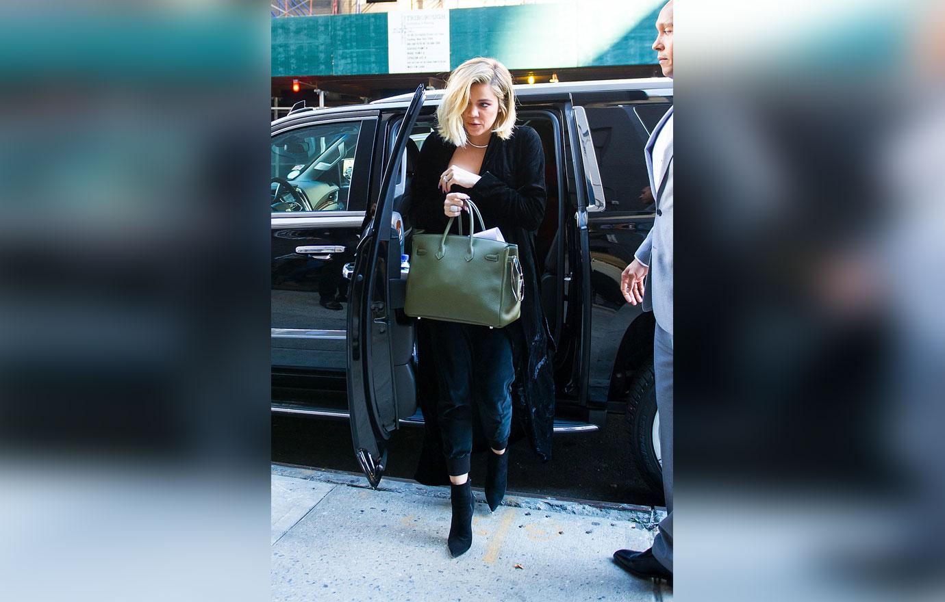 //pregnant khloe kardashian morning sickness