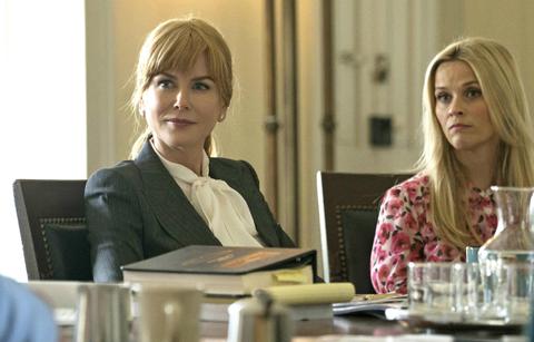 Nicole Kidman wore a grey business suit with a white blouse, while Reese Witherspoon sported a pink flower spotted dress in Big Little Lies.