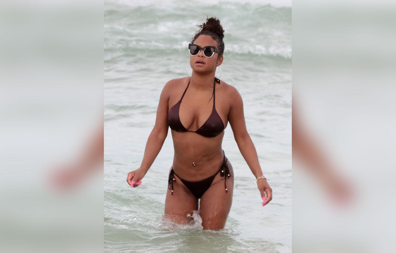 Christina Milian slips into teeny tiny bikini as she continues to show off  her curves on Miami Beach - Mirror Online