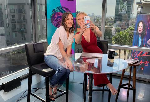 Jessica McNamee posing for a selfie with host, Alyssa Julya Smith
