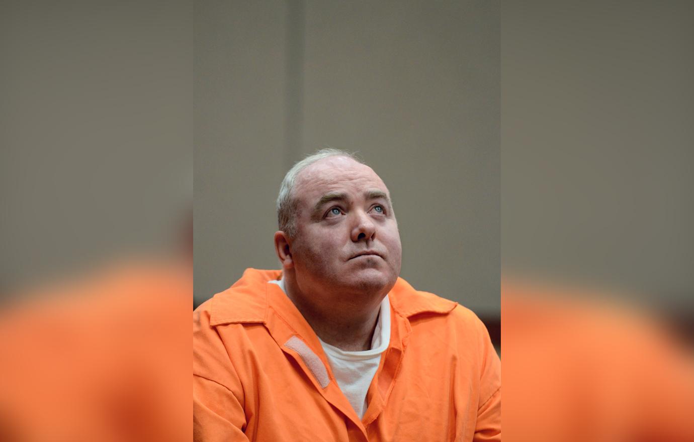 Michael Skakel looks up while listening to a statement from John Moxley, brother of victim Martha Moxley in court in Middletown, Conn.,