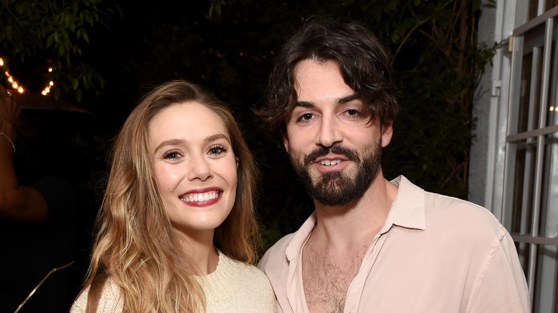 Elizabeth Olsen and Robbie Arnett Smiling Together