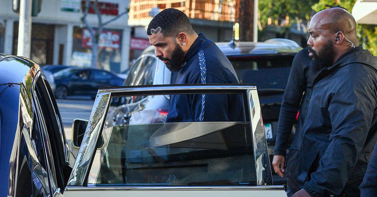 Drake getting into his Rolls-Royce