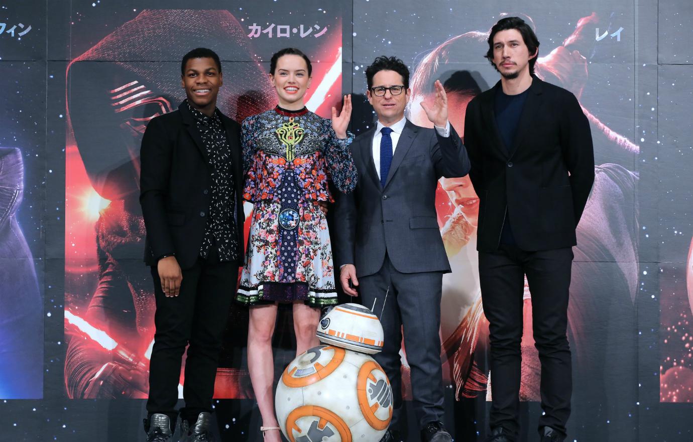 John Boyega, actress Daisy Ridley, director J.J. Abrams and actor Adam Driver pose with BB-8 at the press conference for 'Star Wars: The Force Awakens' Japan premiere at the Sheraton Grande Tokyo Bay Hotel on December 11, 2015 in Urayasu, Japan.