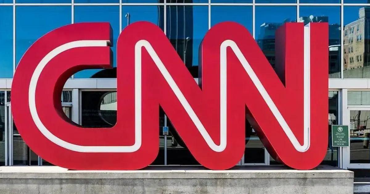 Composite photo of CNN logo.