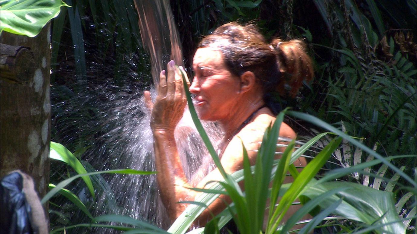 Wet Hot! Caitlyn Jenner Strips Down To A Skimpy Black Bikini In Australia!