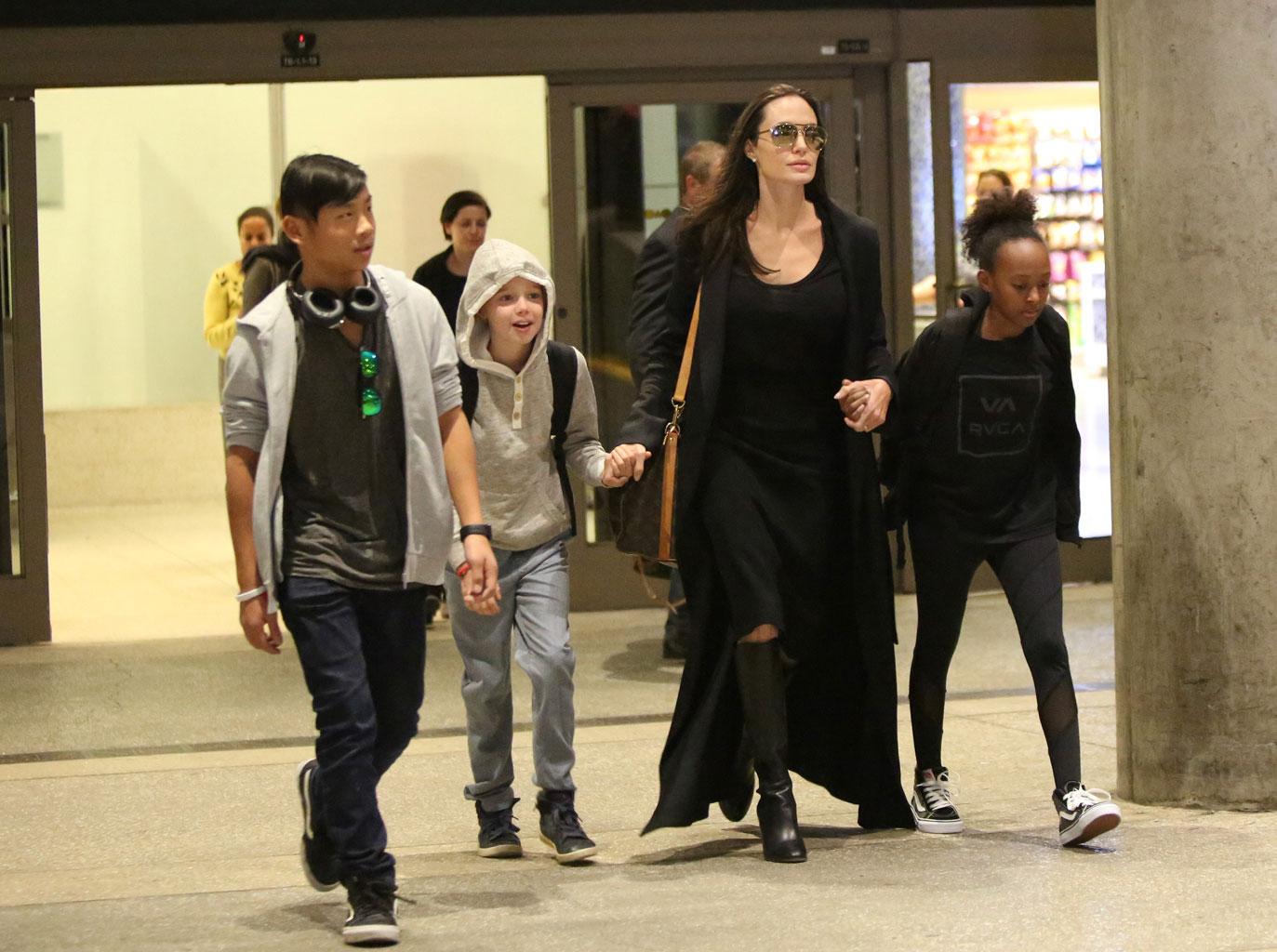 //angelina jolie kids lax tattoo