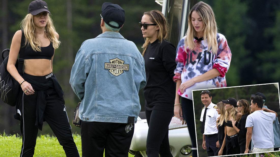 Miley Cyrus spotted leaving the Dolomites by helicopter with sister Brandi and friend Kaitlynn Carter