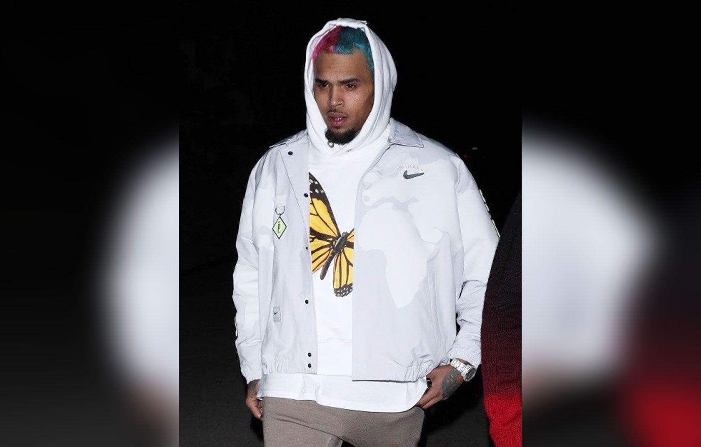 chris brown no charges battery la mansion woman weave smacked off