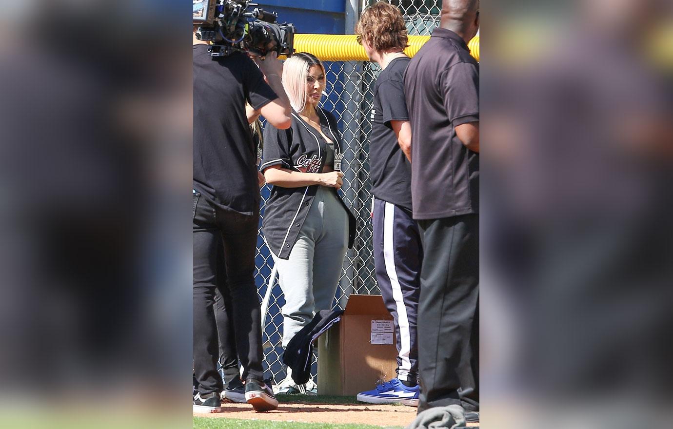 Kim Kardashian Wears Bra Top & Yeezy at Family Softball Game – Footwear News