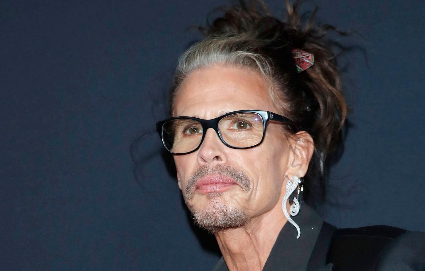 Steven Tyler in glasses.