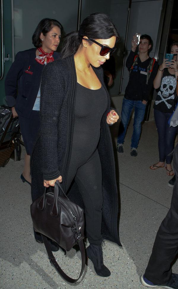 kim kardashian pregnant bump changing