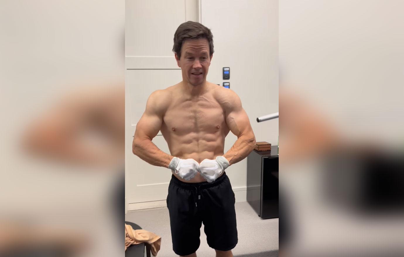 mark wahlberg shows off muscles workout