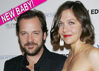 //maggie gyllenhaal peter saarsgard baby girl splash