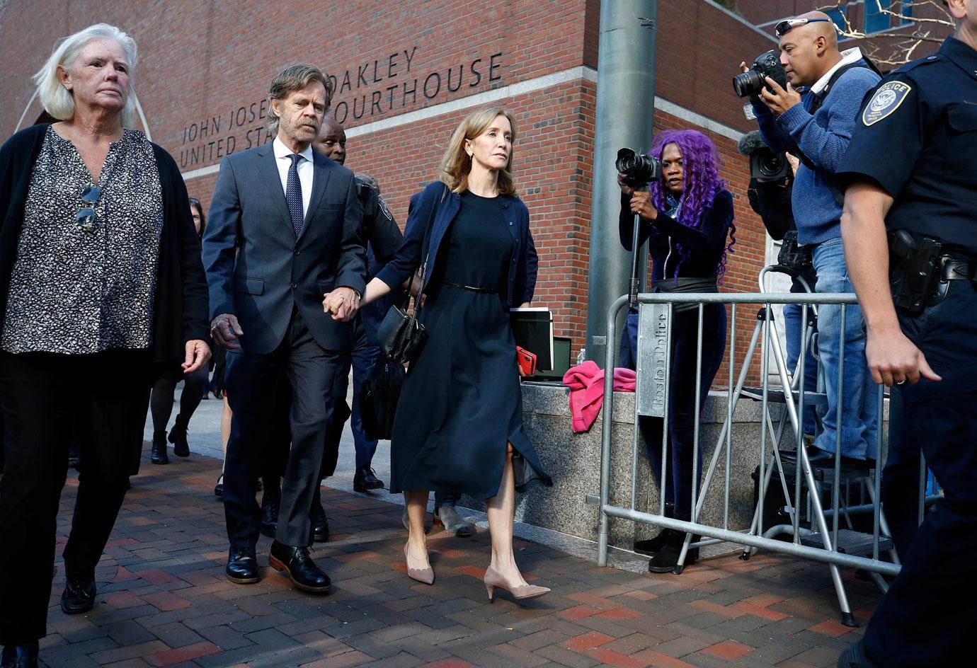 Felicity Huffman leaves federal court with her husband William H. Macy after she was sentenced in a nationwide college admissions bribery scandal, in Boston