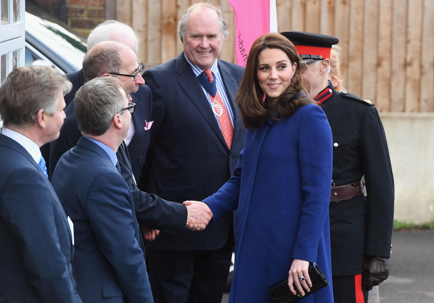 Pregnant Kate Middleton Shows Off Huge Baby Bump In New Photos