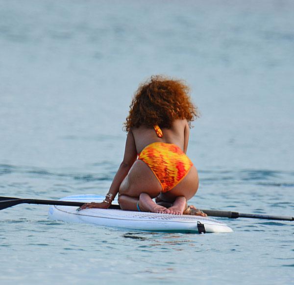 //rihanna swimsuit paddleboarding photos