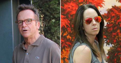 tom arnold divorce fight ex wife million