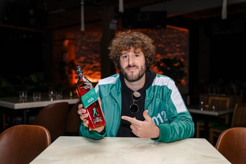 lil dicky joins johnnie walker and netflixs squid game to hype fans ahead of the highly anticipated season two streaming on netflix december th