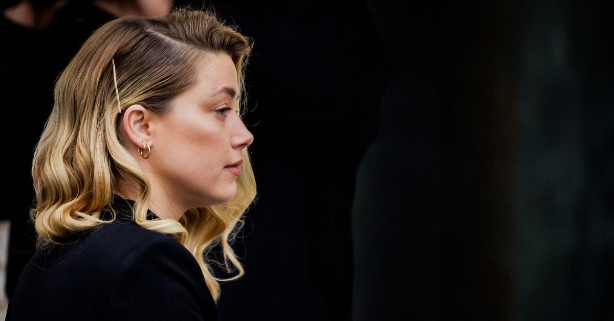 amber heard australia dog perjury amid defamation trial