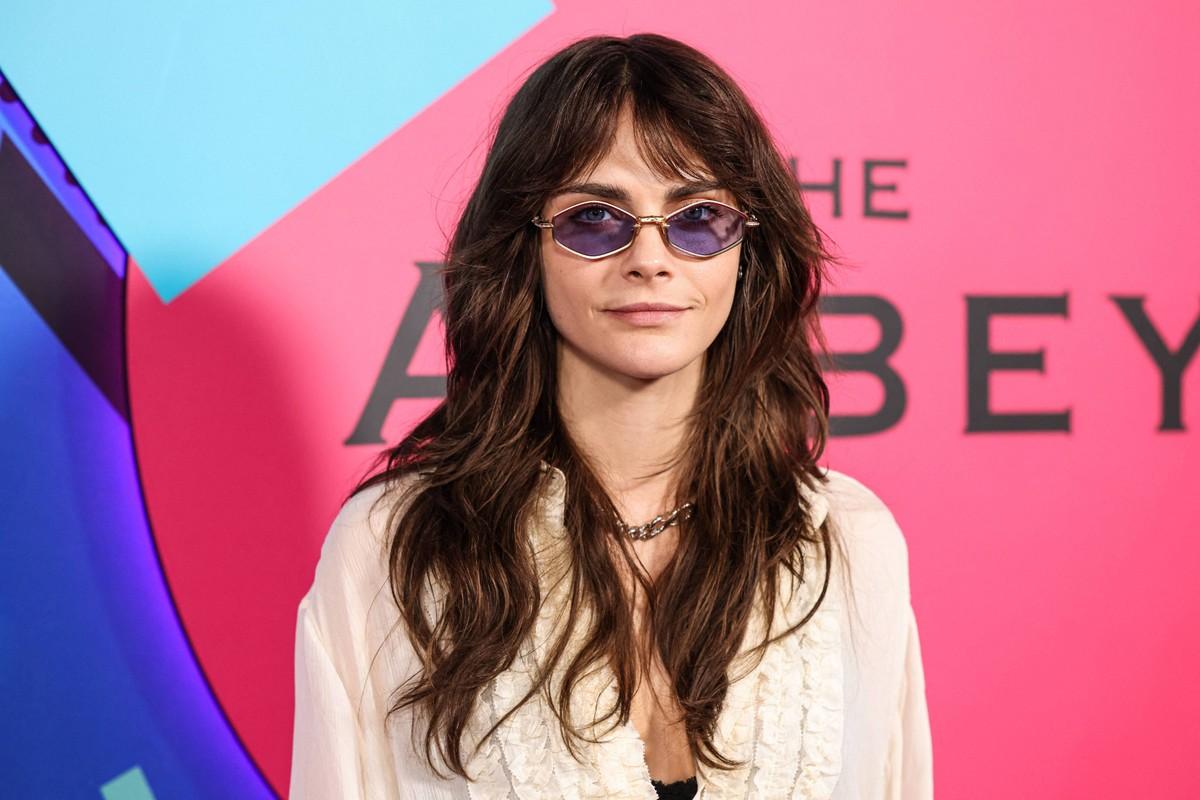 Cara Delevingne said she and Amber Heard became 'entangled' after the actress' divorce from Johnny Depp.