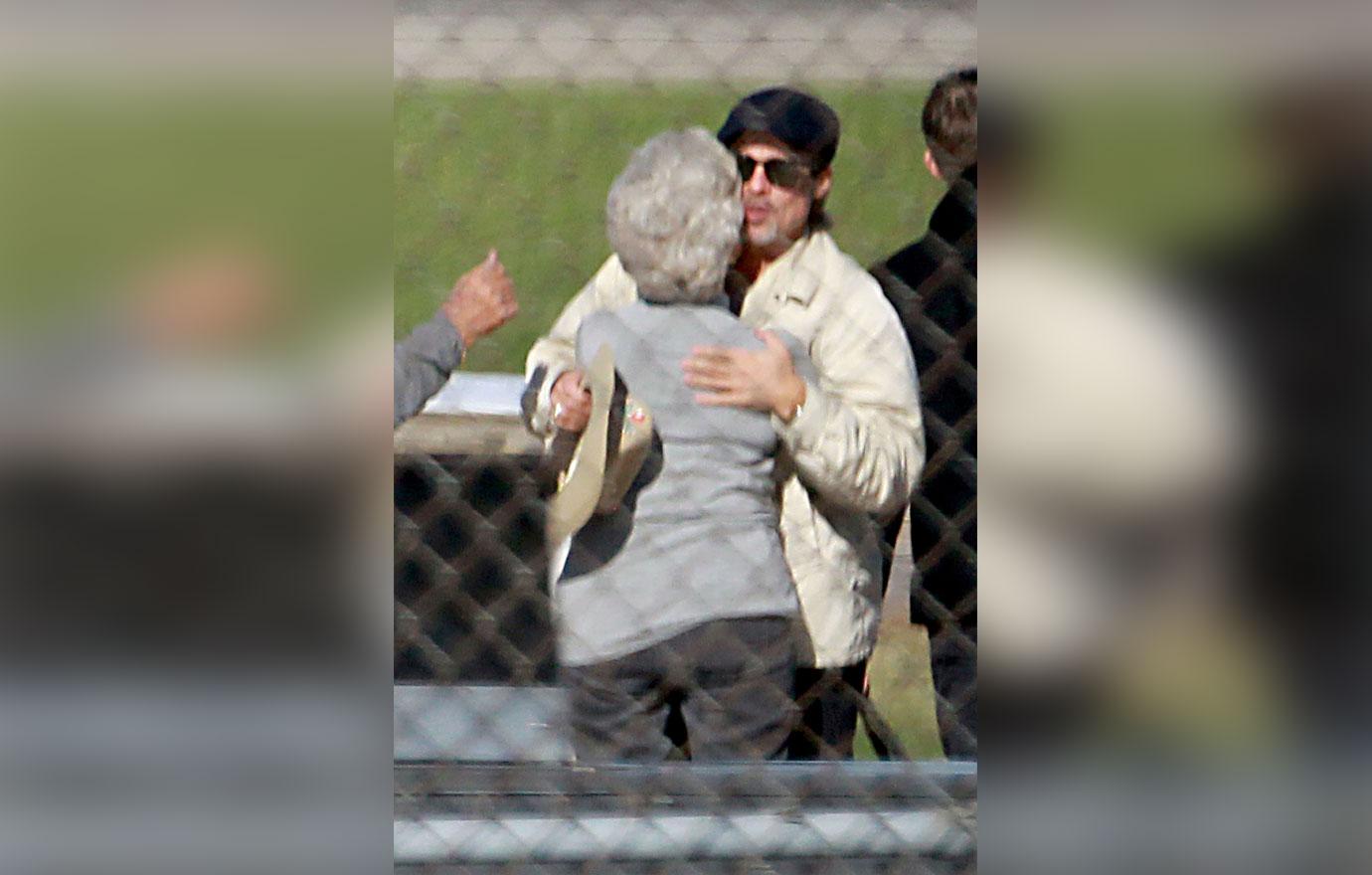 Brad Pitt hugging his parents in Missouri