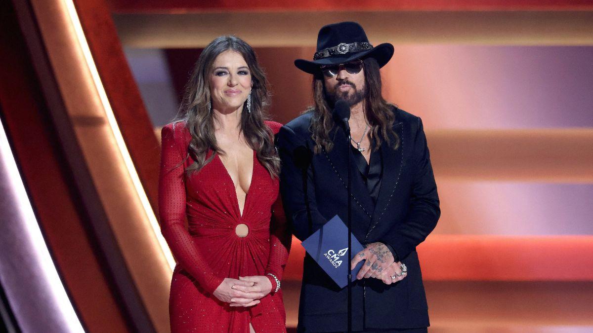 liz hurley fuels latest cyrus family feud billy ray