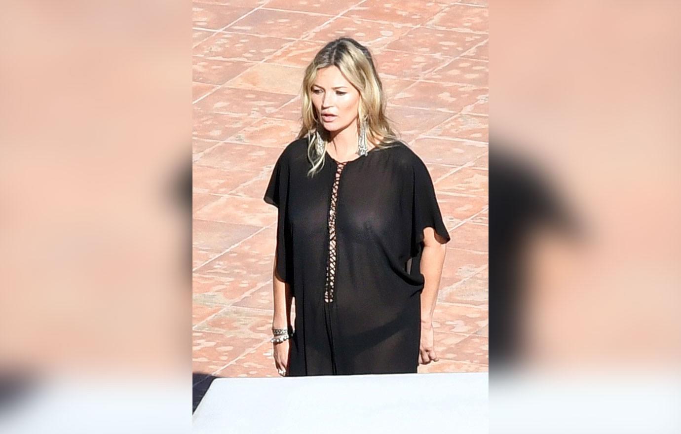 Kate Moss Goes Braless For Yves Saint Laurent Shoot