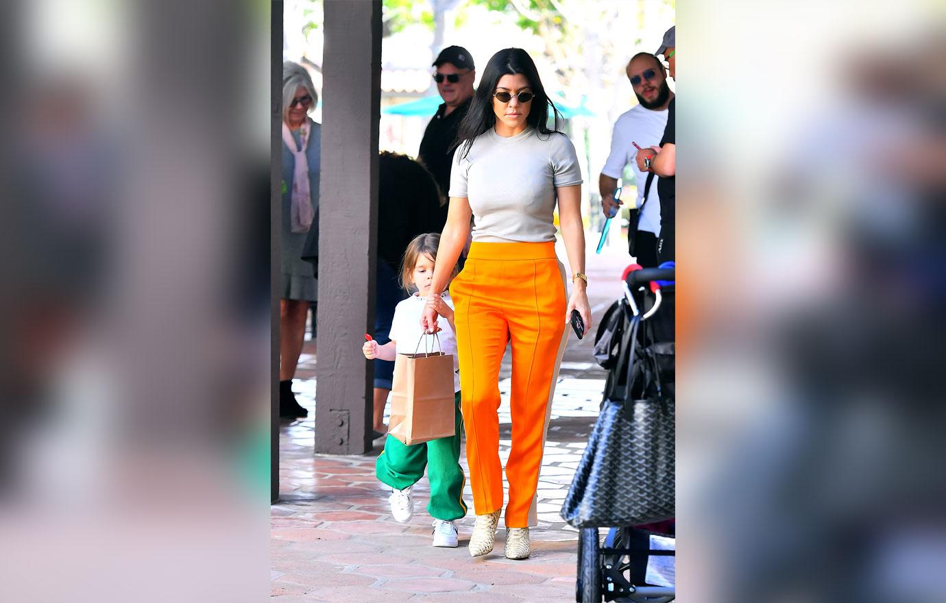 Kourtney Kardashian Hands Son Reign To Scott Disick