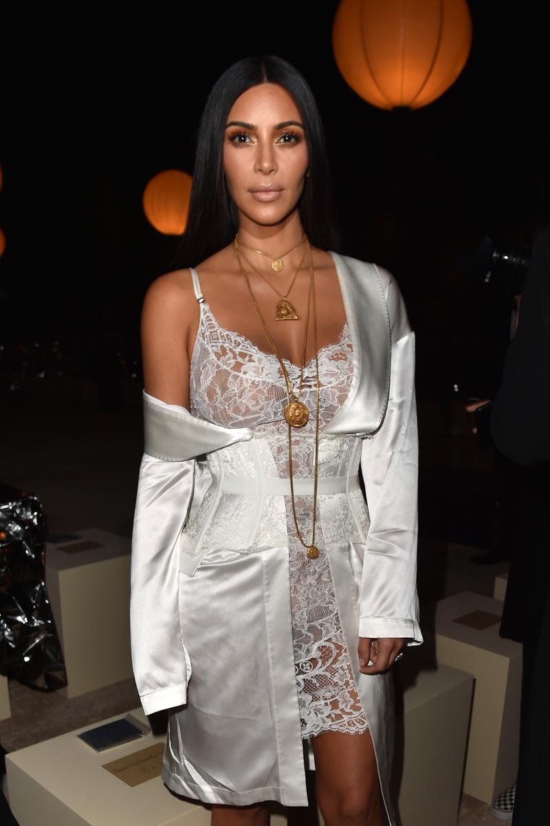 kim kardashian held at gunpoint paris family emergency