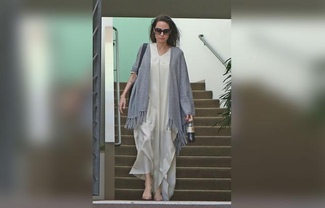 Angelina Jolie Shows Off Skinny Arms As She Sips On Diet Drink