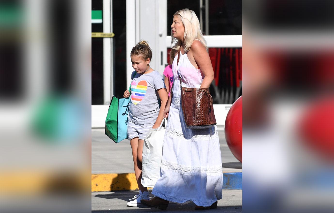 Tori spelling shops target money problems