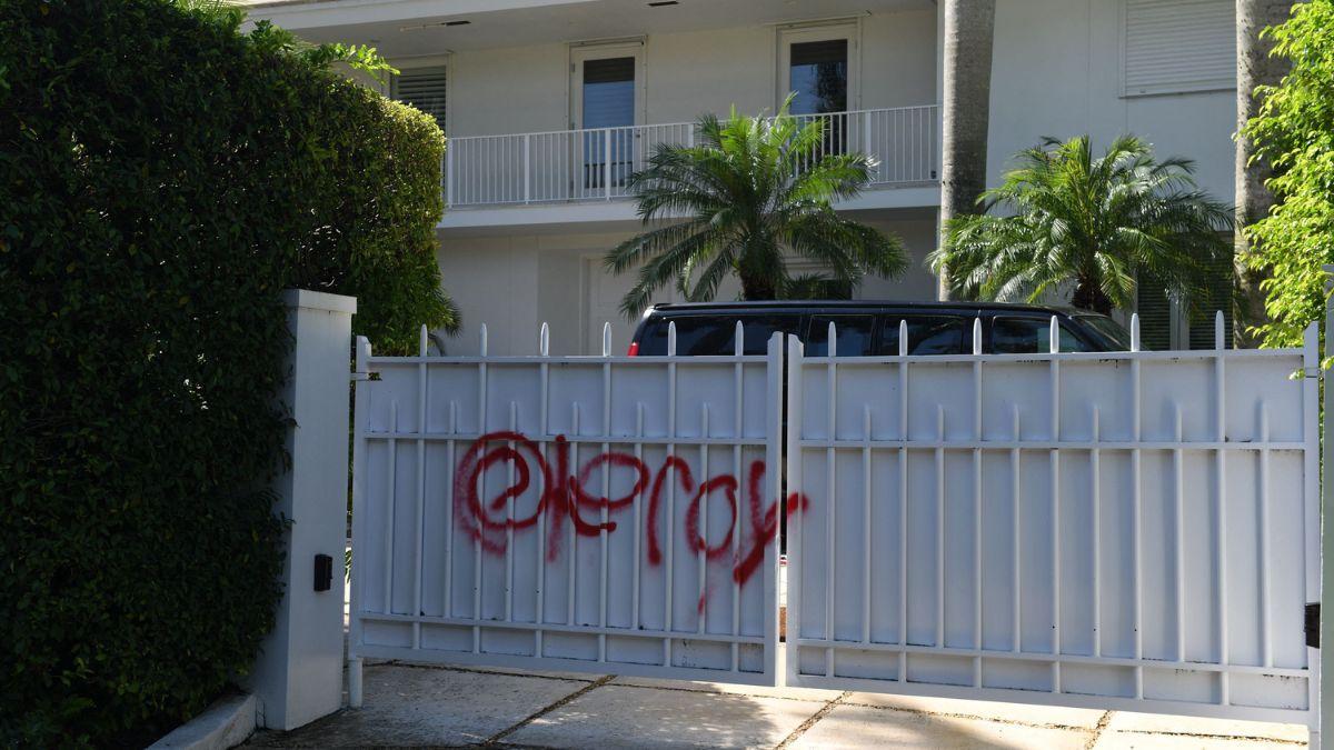 A photo of Jeffrey Epstein's Palm Beach home with graffiti