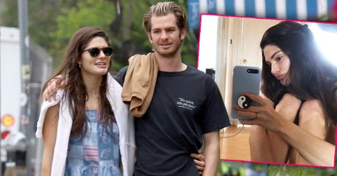 Christine Gabel in Patchwork Dress and Andrew Garfieldin Green Workpants And Black T-Shirt Walking Down The Street With Their Arms Around Eachother Inset Christine Gabel In Apartment Nude Sitting On Floor Taking Selfie