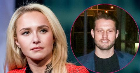 Hayden Panettiere wears a red sweater, Brian Hickerson wears a blue suit jacket and black shirt.