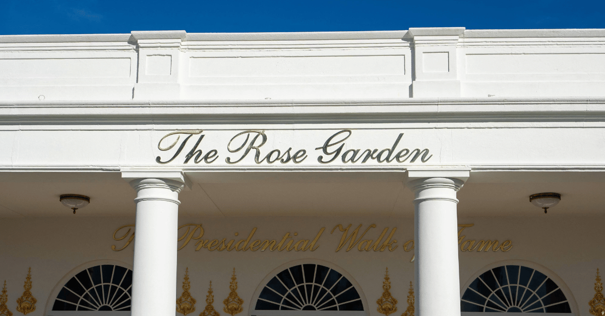 Photo of The Rose Garden sign at the White House