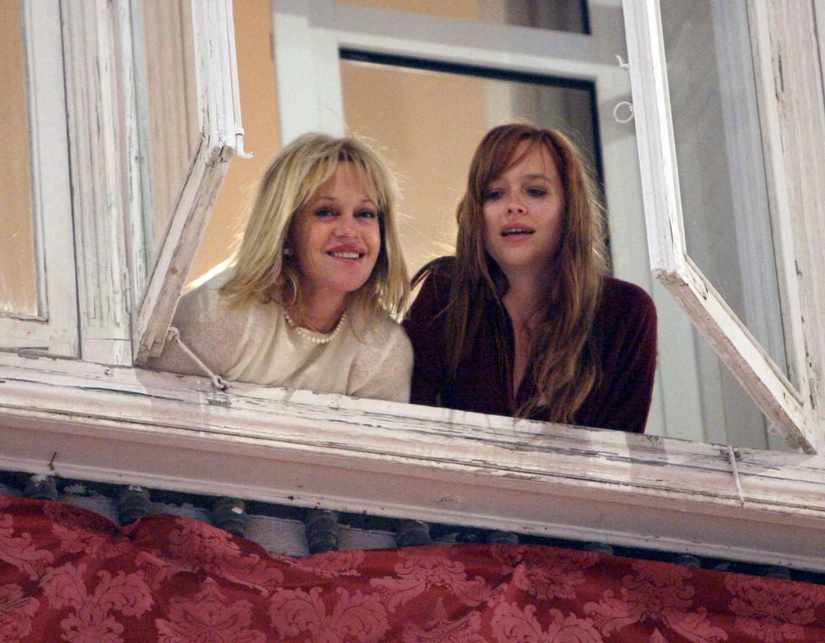 Melanie Griffith and Don Johnson are reportedly concerned about Dakota Johnson's connection with Machine Gun Kelly.