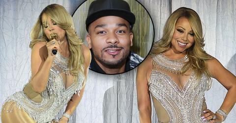 Mariah Carey Exposes Butt While Holding Another Man