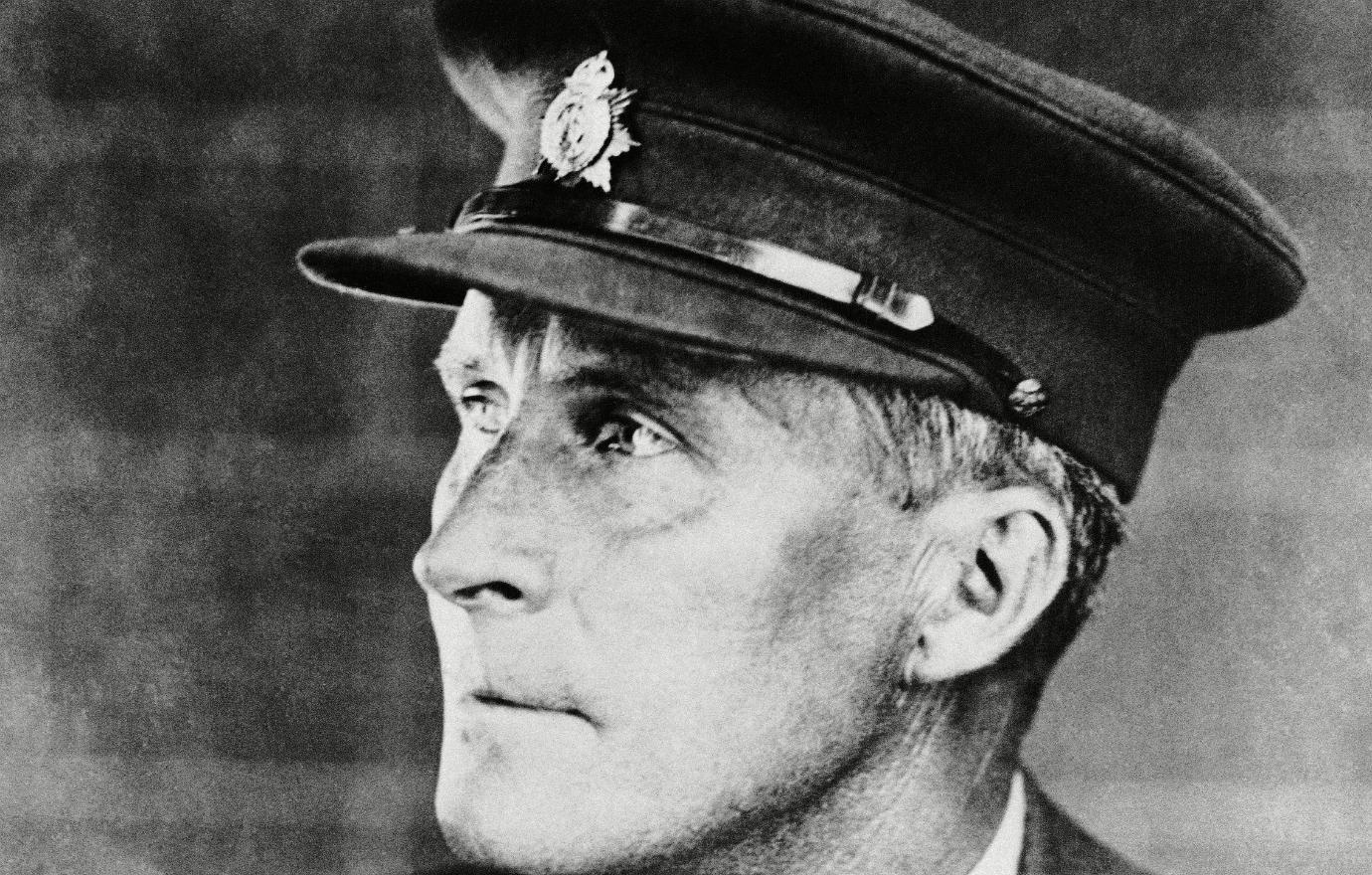 A black and white close up of William Desmond Taylor in a military cap.