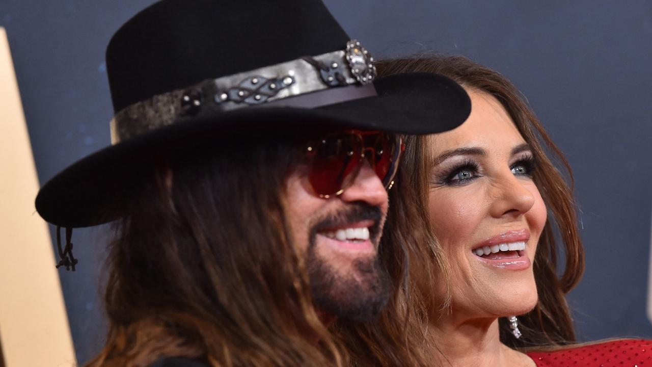 Photo of Billy Ray Cyrus, Elizabeth Hurley