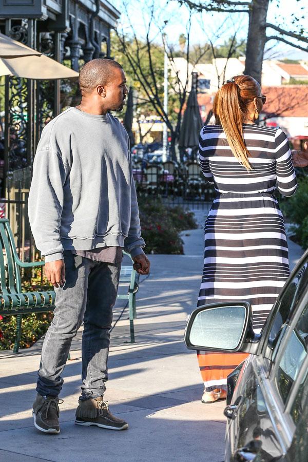 //kanye west caught checking out womans butt​