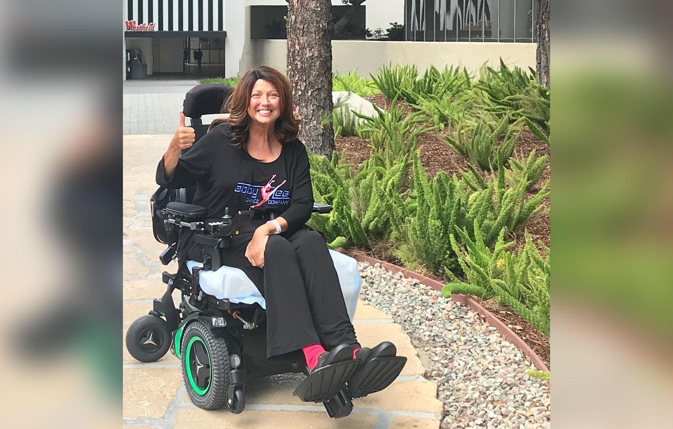 Why is Abby Lee Miller using a wheelchair?