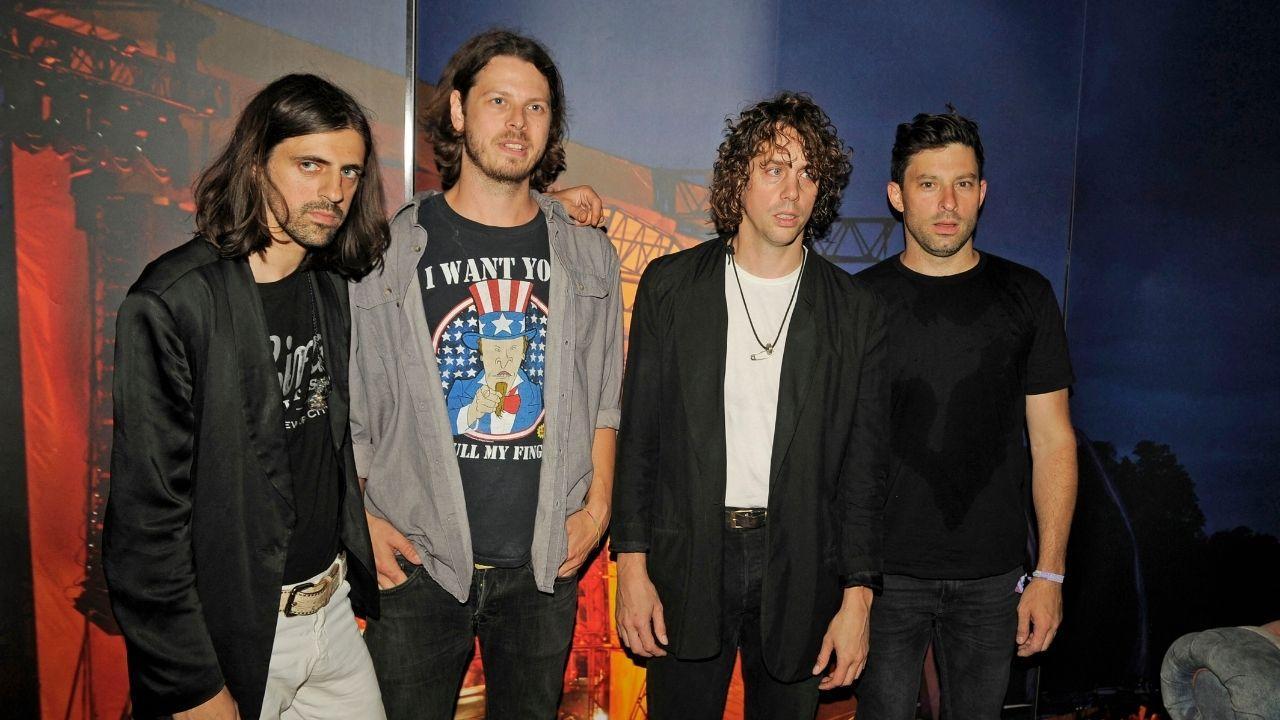 Photo of Johnny Borrel with Razorlight members.