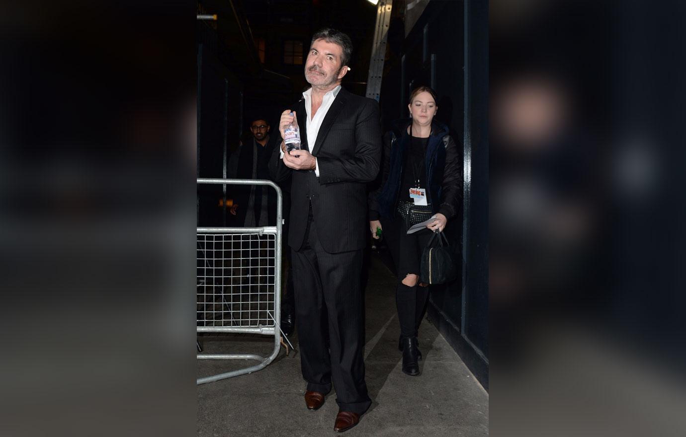 Simon Cowell Steps Out After Health Scare Fall