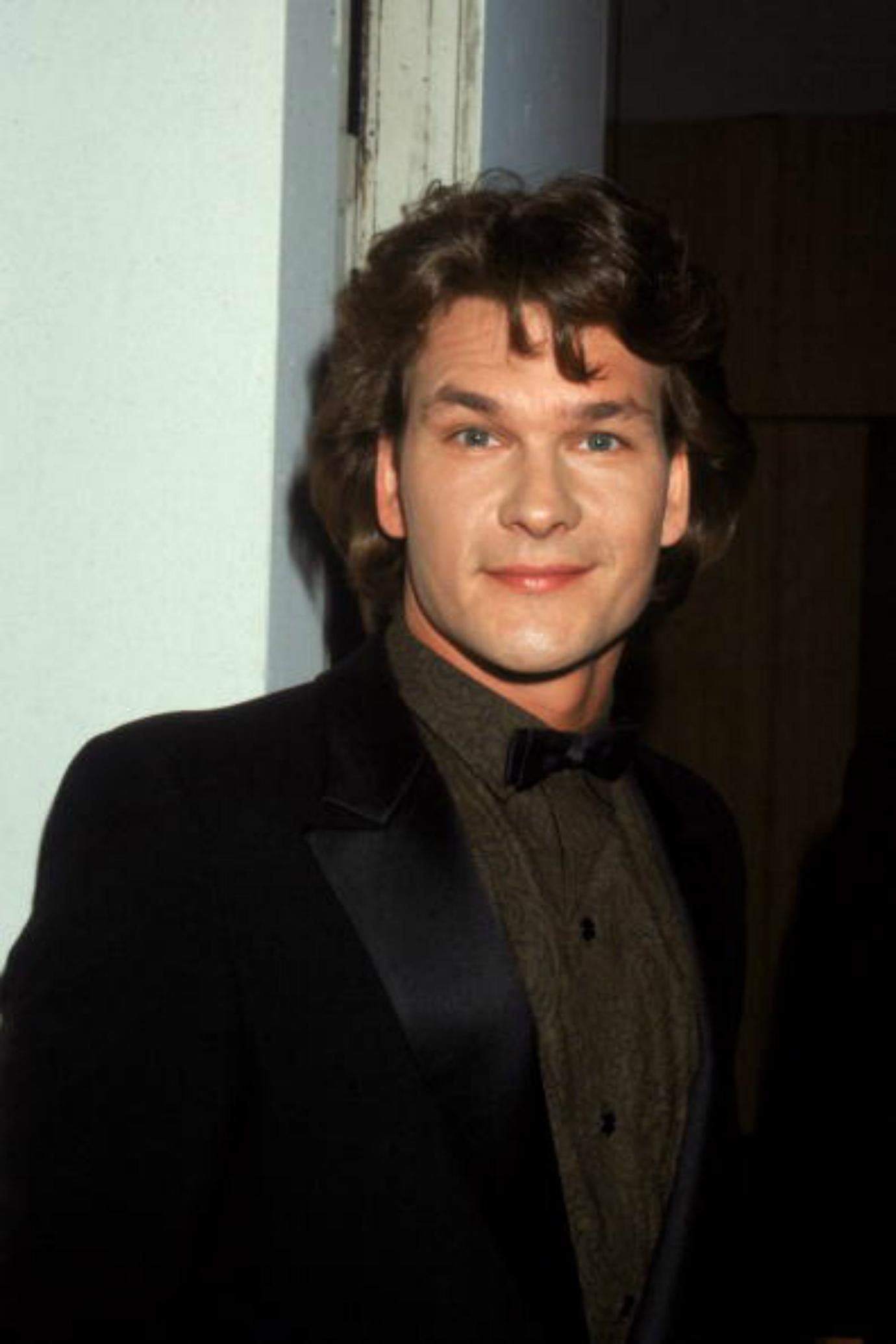 Patrick Swayze poses for a photo.