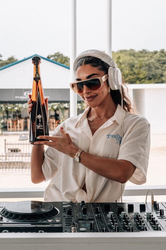 chantel jeffries celebrates with tequila don julio  during her dj set out east before attending the palm tree music festival in the hamptons on june nd