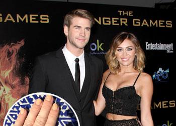 //miley cyrus liam hemsworth ring