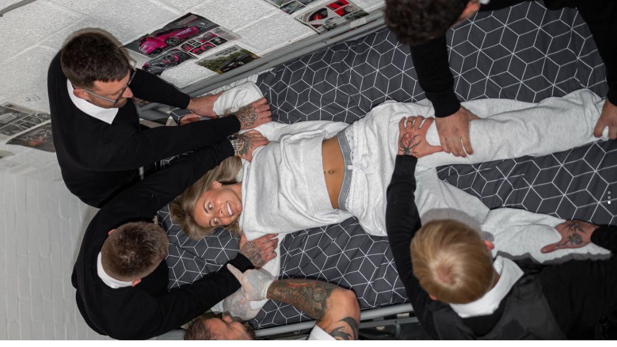 Photo of Bonnie Blue with multiple men