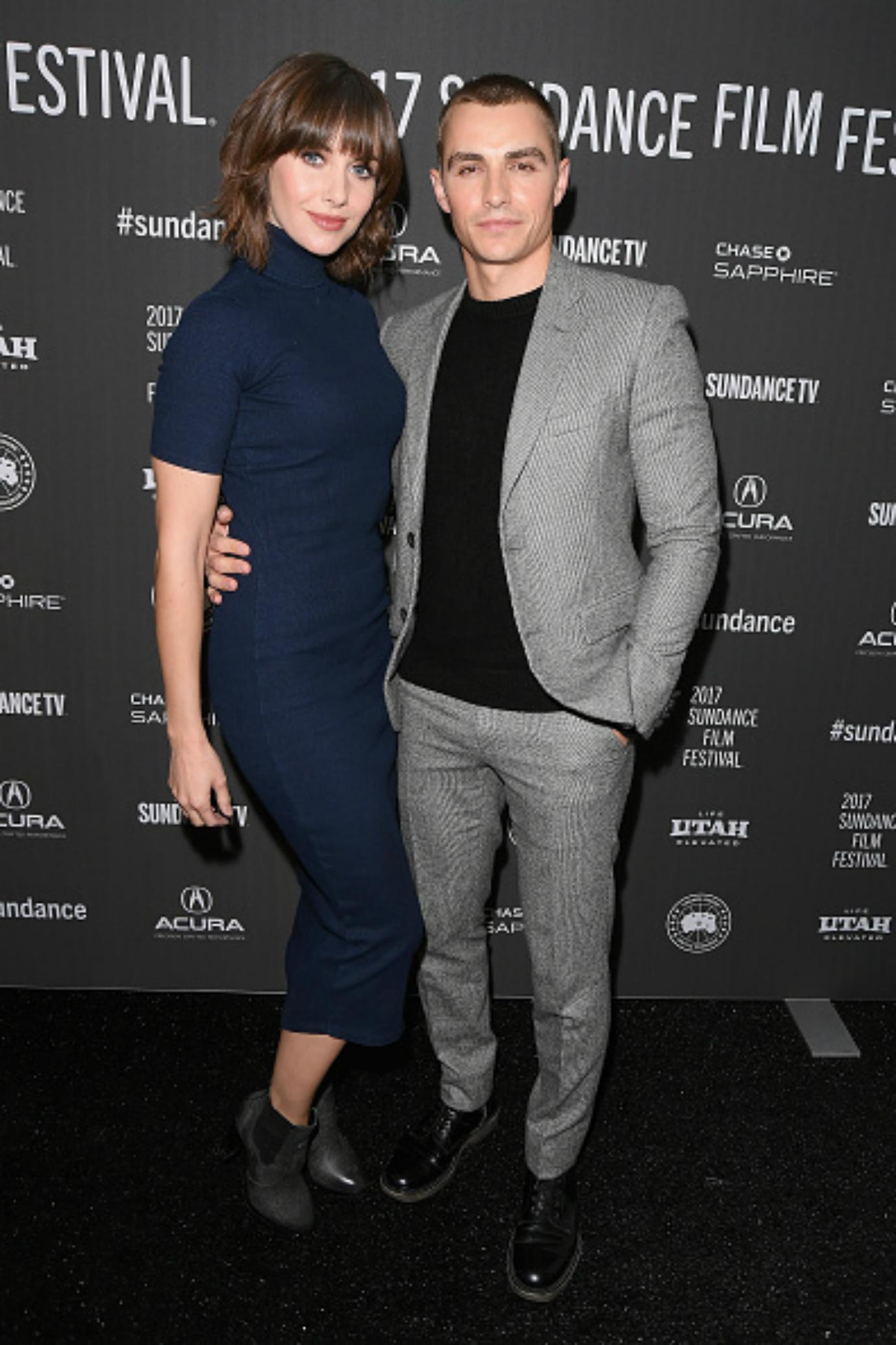 Alison Brie and Dave Franco pose on the red carpet.