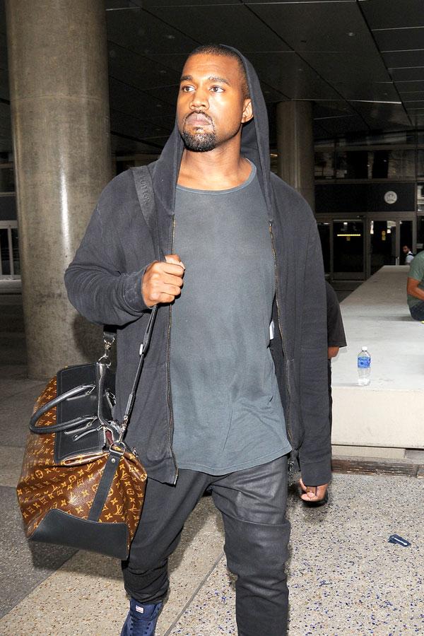 //kanye west apologizes attacking photographer daniel ramos lawsuit